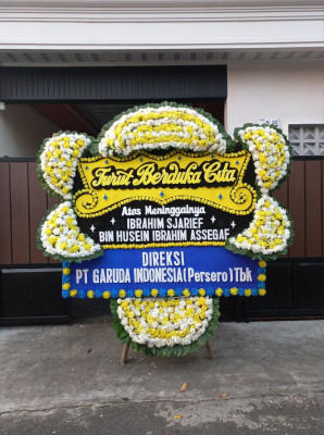 Papan Bunga Duka di Tanah Sepenggal