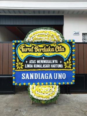 Papan Bunga Duka di Tanah Sepenggal